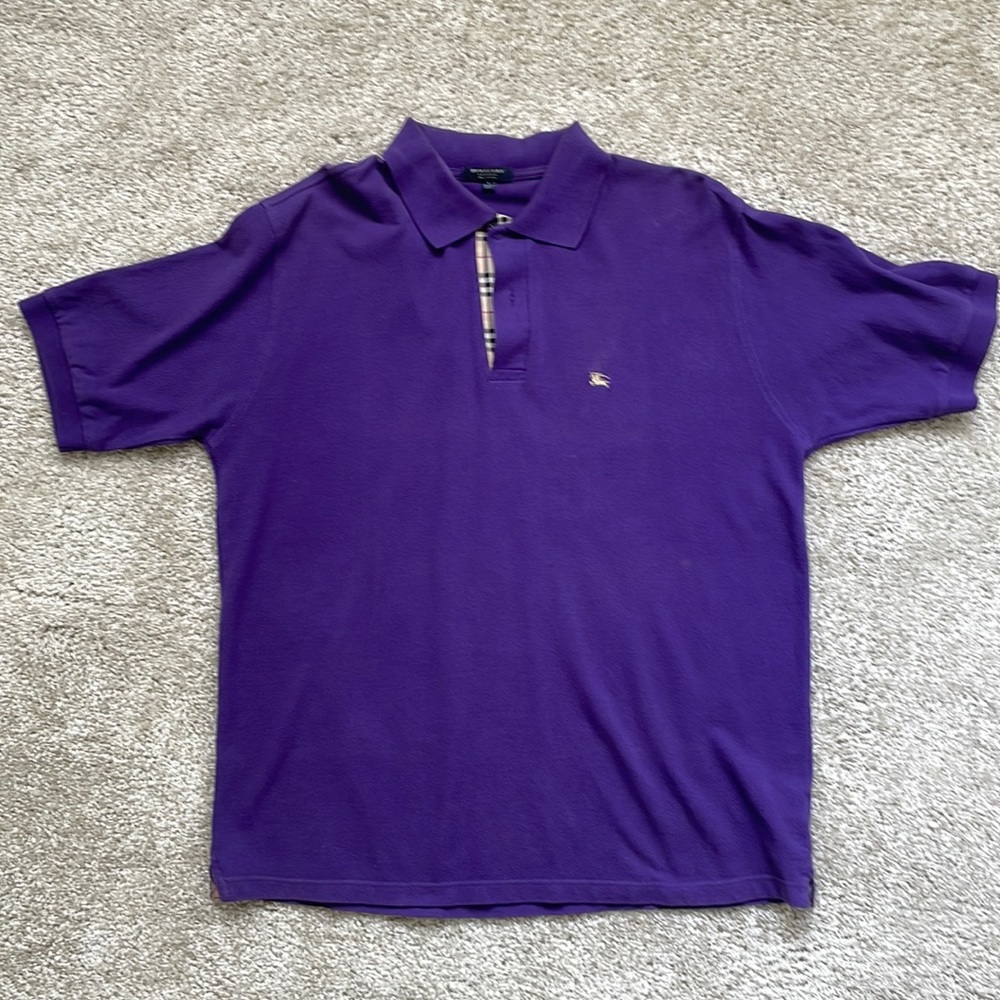 Mens authentic Size L Burberry polo. In used condition with light signs of wear